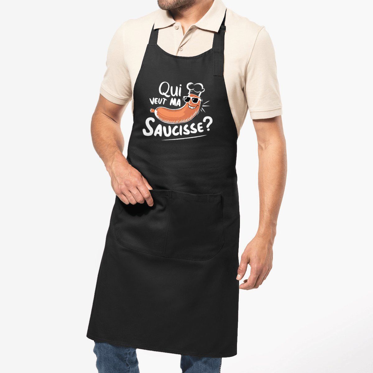 Tablier homme humour Qui veut ma saucisse - 100% coton bio Tablier homme humour Qui veut ma saucisse - 100% coton bio